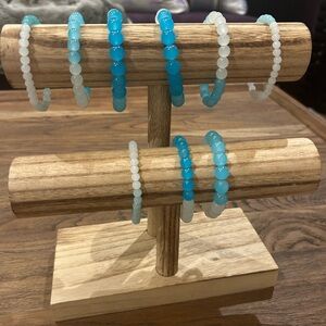 Assorted blue glass bead bracelets
